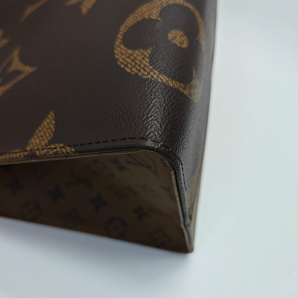 ONTHEGO GM Monogram Coated Canvas Brown