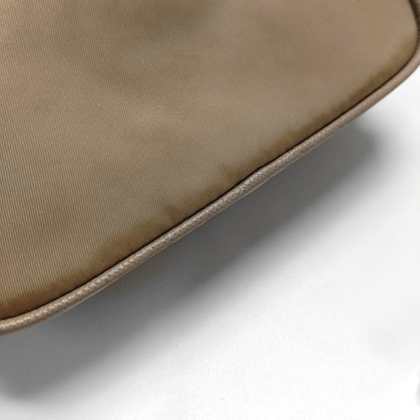 Authenticated pre-owned Re-Edition Nylon Beige - Shoulder Bag at Looply