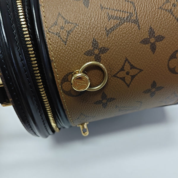 CANNES PM Monogram Coated Canvas Brown