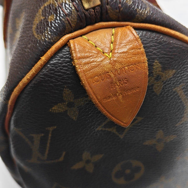 SPEEDY 25 Monogram Coated Canvas Brown