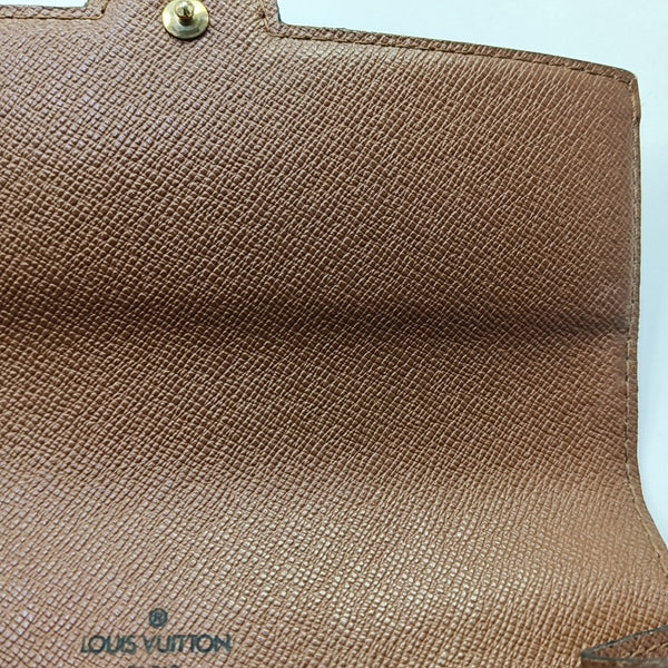 ARCHE Monogram Coated Canvas Brown