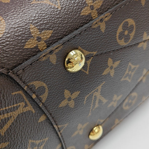MONTAIGNE GM Monogram Coated Canvas Brown