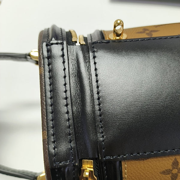 CANNES PM Monogram Coated Canvas Brown