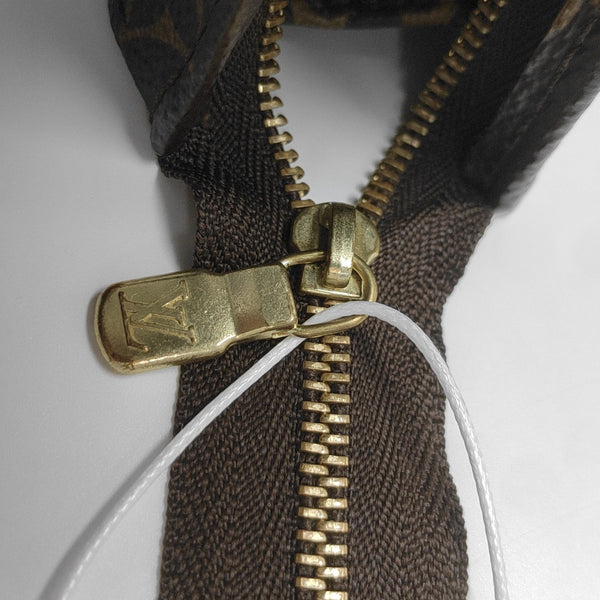 TOILET POCKET 19 Monogram Coated Canvas Brown