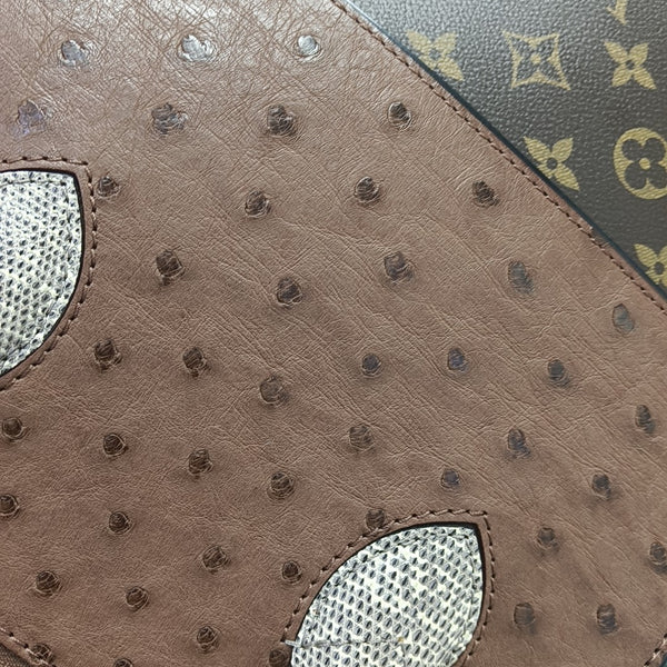 MAJESTUEUX Monogram Coated Canvas Brown