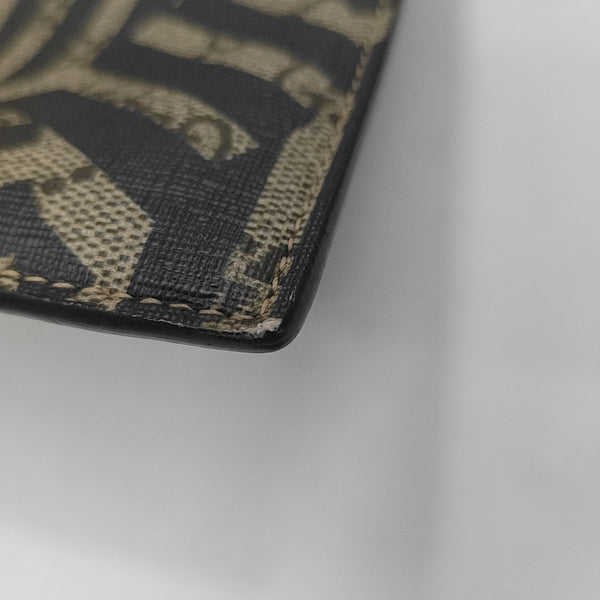 Monogram Coated Canvas Clutch Multicolor