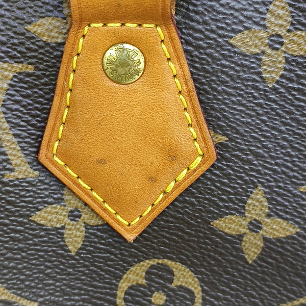 SPEEDY 25 Monogram Coated Canvas Brown