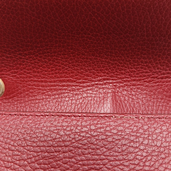 Piel de becerro roja pequeña con GG entrelazadas