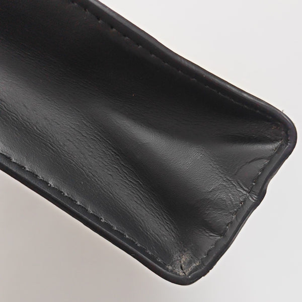 Pochette Voyag MM Monogram Coated Canvas Black