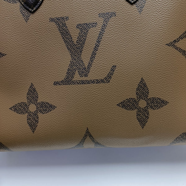 ONTHEGO MM Monogram Coated Canvas Brown