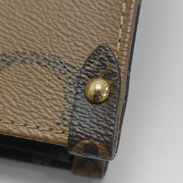 ONTHEGO MM Monogram Coated Canvas Brown