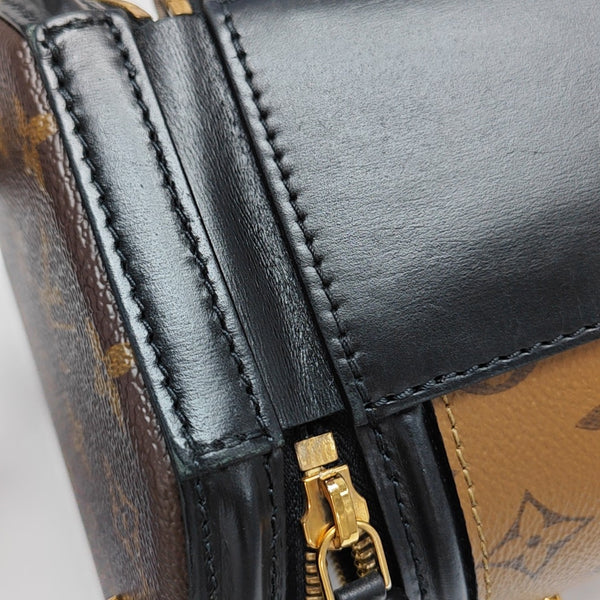 CANNES PM Monogram Coated Canvas Brown