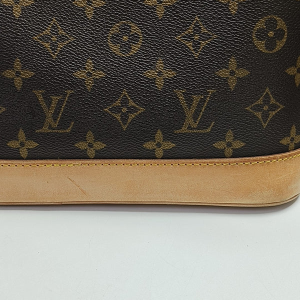 ALMA PM Monogram Coated Canvas Brown