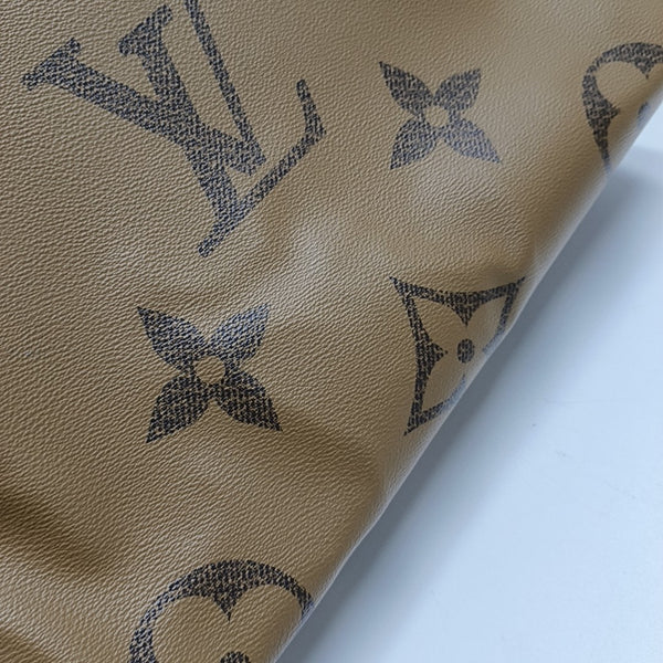 ONTHEGO GM Monogram Coated Canvas Brown