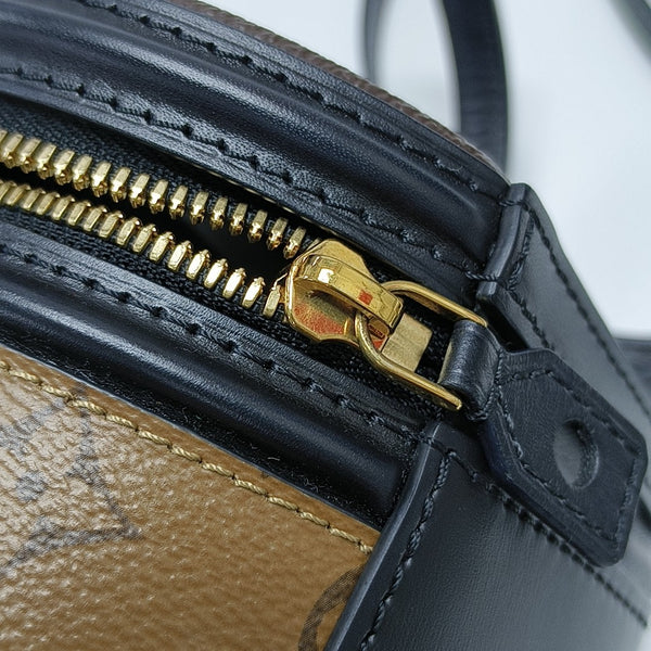CANNES PM Monogram Coated Canvas Brown