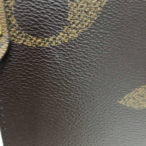 ONTHEGO MM Monogram Coated Canvas Brown