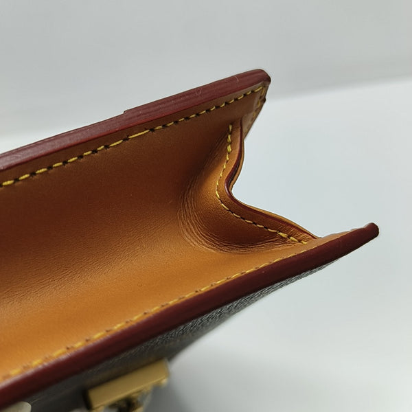 S LOCK Monogram Coated Canvas Brown