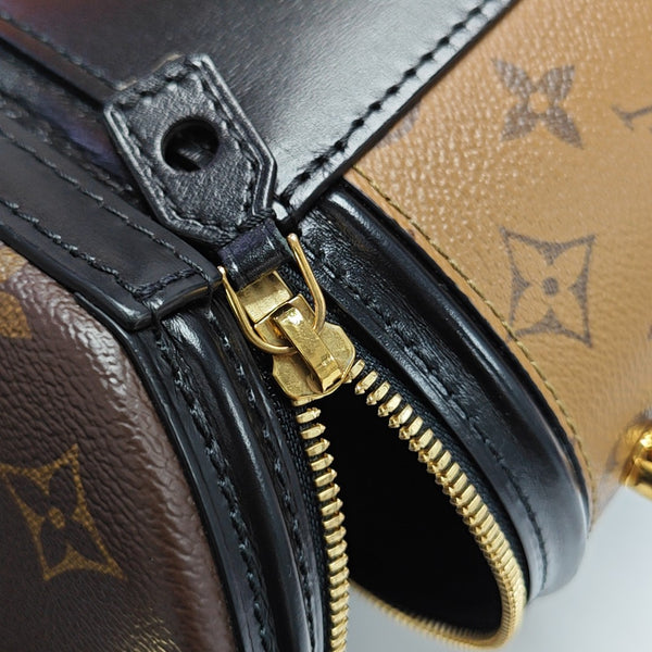 CANNES PM Monogram Coated Canvas Brown
