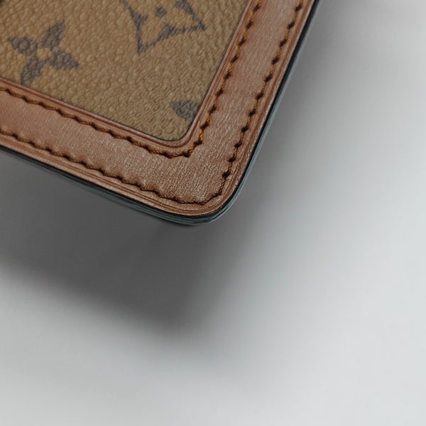 DAUPHINE MM Monogram Coated Canvas Brown