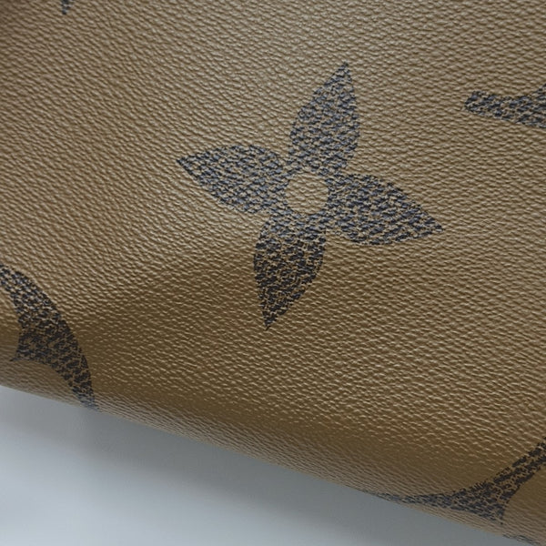 ONTHEGO MM Monogram Coated Canvas Brown