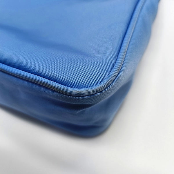 Authenticated pre-owned Re-Edition2000 Mini Nylon Blue - Top Handle Bag at Looply