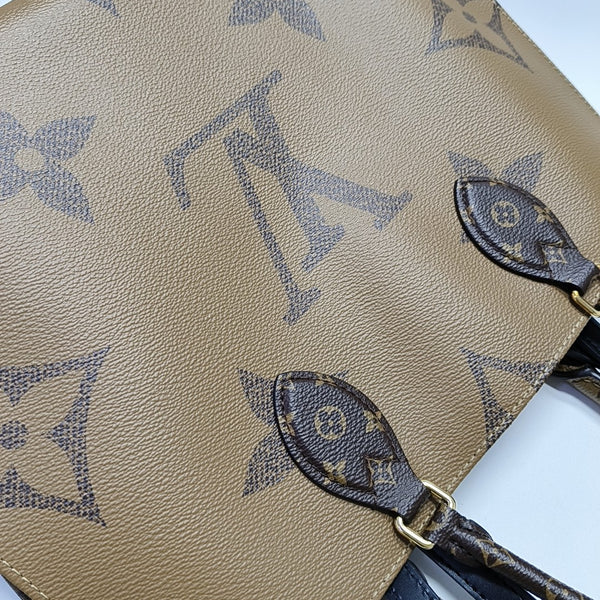 ONTHEGO MM Monogram Coated Canvas Brown