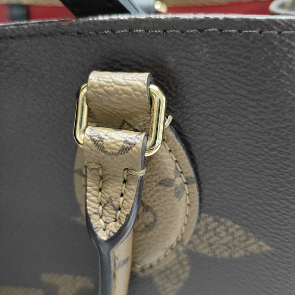 ONTHEGO MM Monogram Coated Canvas Brown