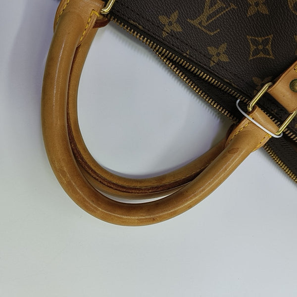 KEEPALL 60 Monogram Coated Canvas Brown