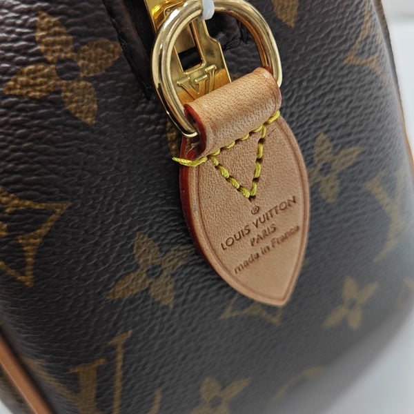 SPEEDY 20 Monogram Coated Canvas Brown