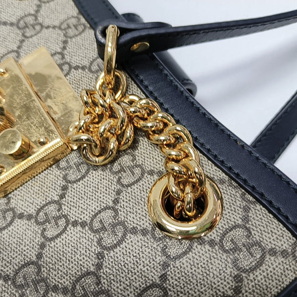 Padlock Small Monogram Coated Canvas Beige
