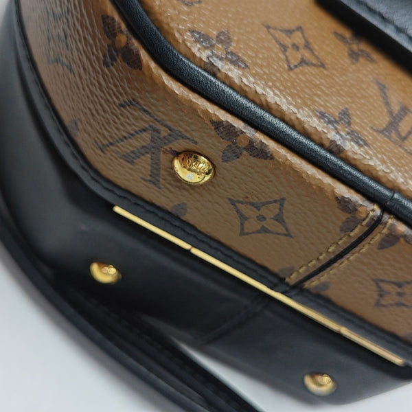 BOITE CHAPEAU PM Monogram Coated Canvas Brown