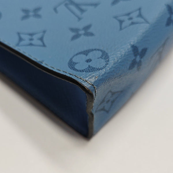 Pochette Voyag MM Monogram Coated Canvas Blue