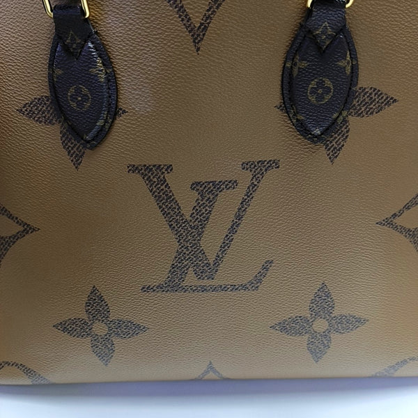 ONTHEGO MM Monogram Coated Canvas Brown