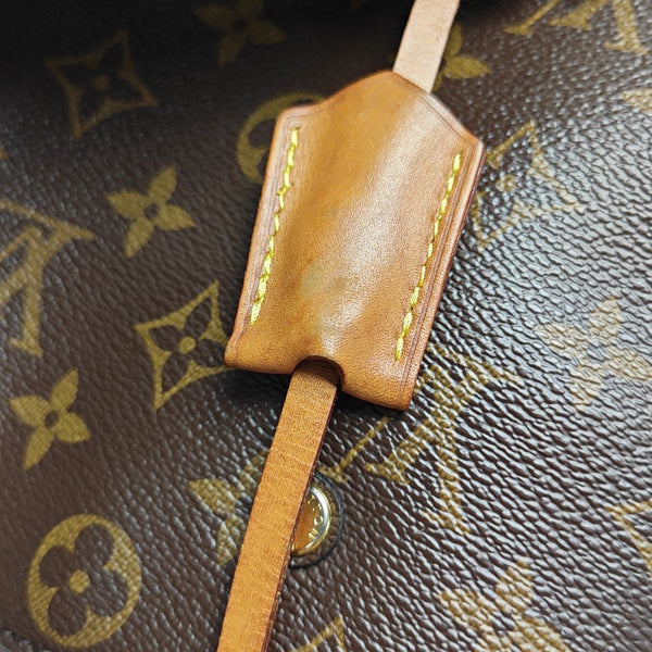 MONTAIGNE Monogram Coated Canvas Brown