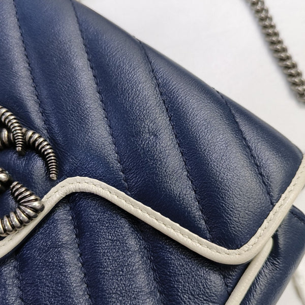 Authenticated pre-owned GG Marmont Super Mini Quilted Calfskin Blue - Shoulder Bag at Looply