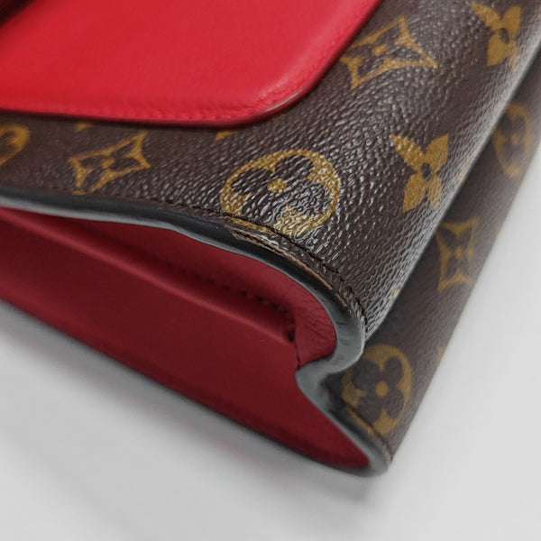 VICTOIRE Monogram Coated Canvas Brown