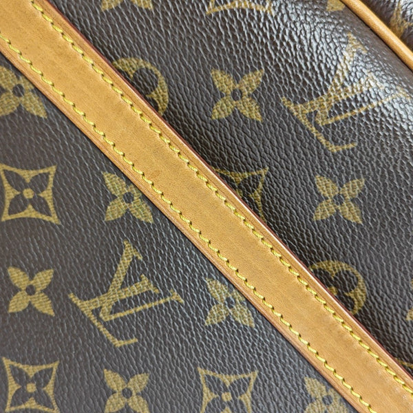 REPORTER Monogram Coated Canvas Brown
