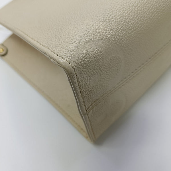 ONTHEGO PM Monogram Calfskin Beige