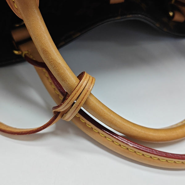 MONTAIGNE GM Monogram Coated Canvas Brown