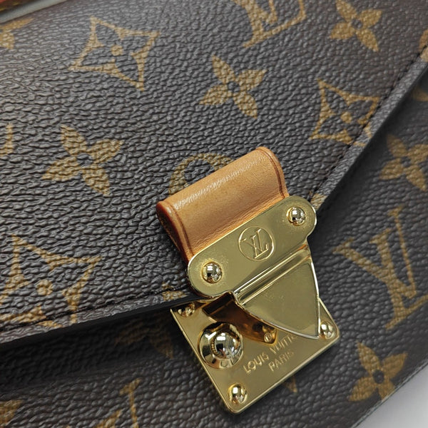 MÉTIS EAST WEST Monogram Coated Canvas Brown