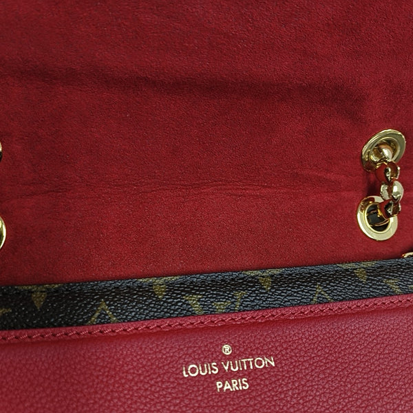 VICTOIRE Monogram Coated Canvas Brown