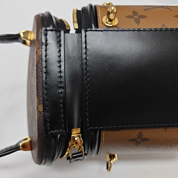 CANNES PM Monogram Coated Canvas Brown