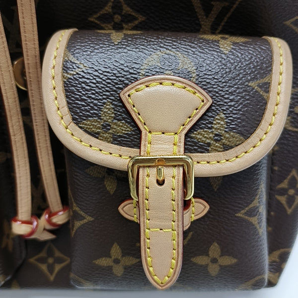 EXCURSION PM Monogram Coated Canvas Brown