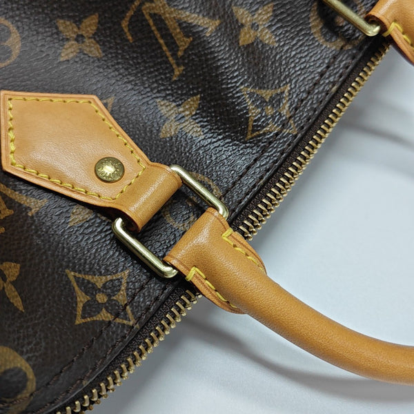 SPEEDY 25 Monogram Coated Canvas Brown