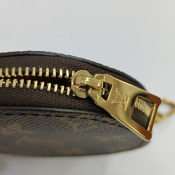 ONTHEGO PM Monogram Coated Canvas Brown