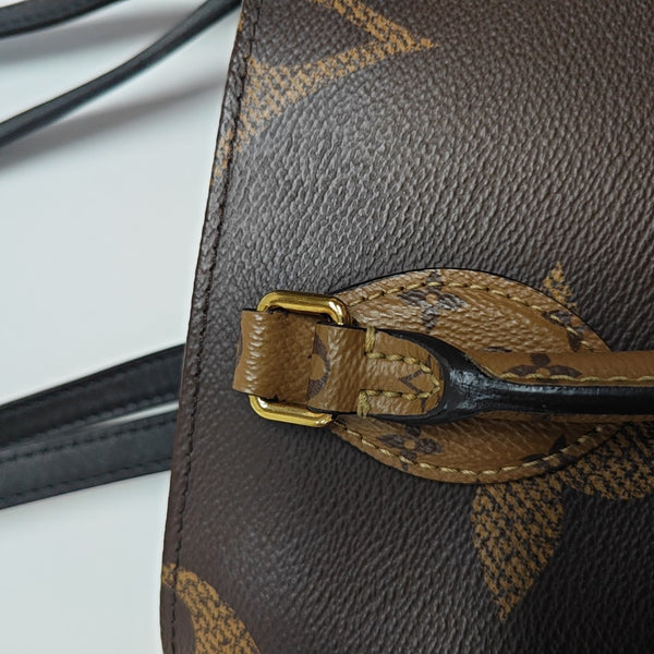 ONTHEGO MM Monogram Coated Canvas Brown