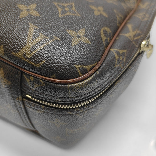 EXCURSION Monogram Coated Canvas Brown