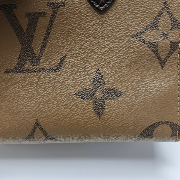 ONTHEGO PM Monogram Coated Canvas Brown