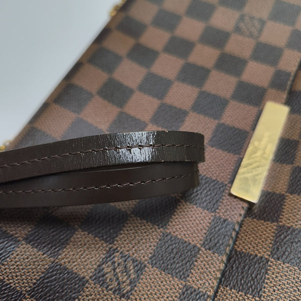 FAVORITE MM Damier Ebene Coated Canvas Brown