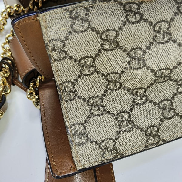 Padlock Small Monogram Coated Canvas Beige